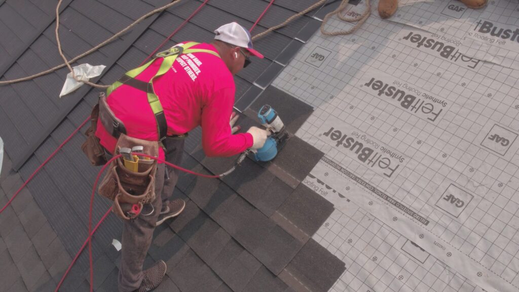 Installer-on-Roof-2048x1152